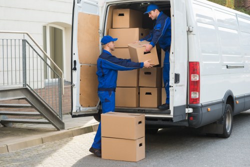 Packed boxes and furniture prepared for a house move in Harringay
