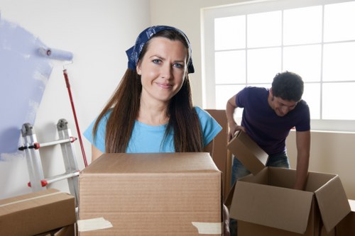 Packed boxes and furniture ready for apartment removals